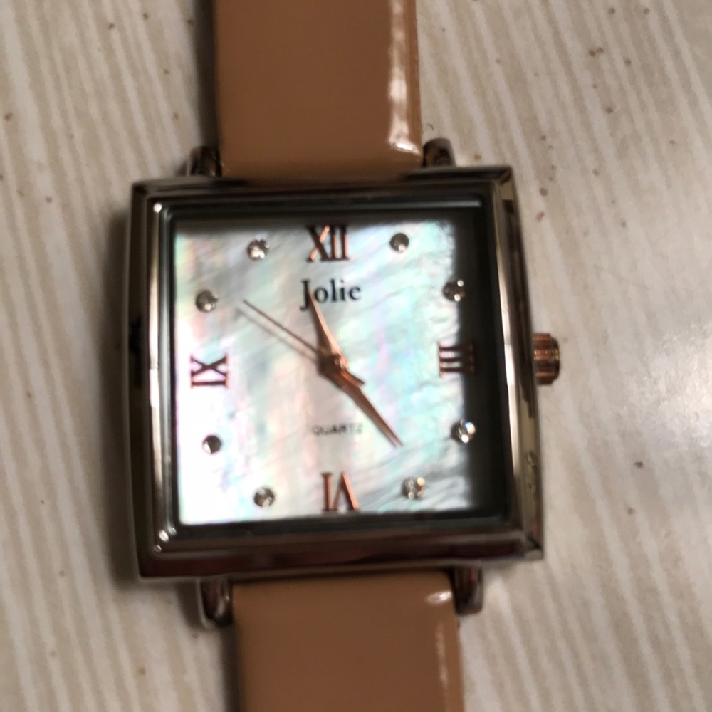 Jolie ladies with neutral tan strap band